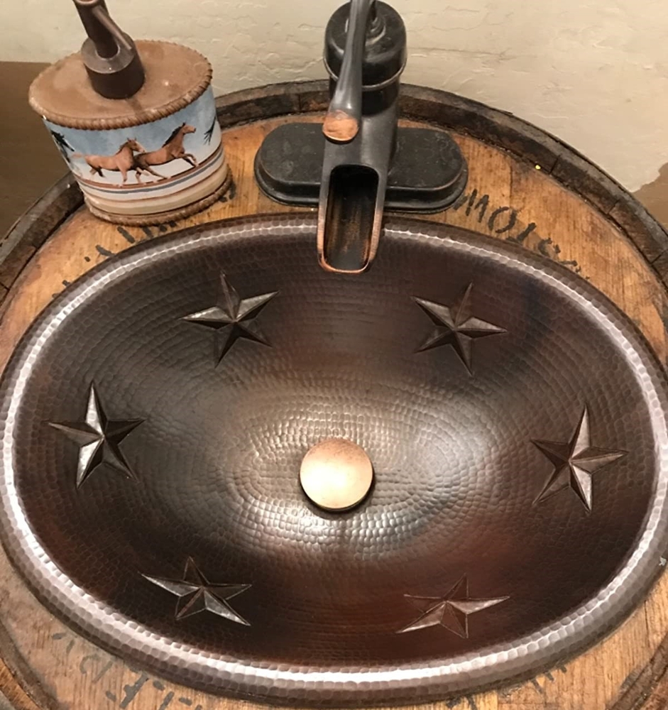 https://www.simplycopper.com/19-oval-copper-bath-sink-stars-design