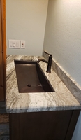 Image Rectangular Copper Bathroom Sink Shown in Aged Copper